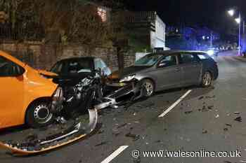 Multi-car crash shuts main road as police make arrest