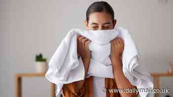 You've been doing the laundry wrong! Experts reveal how often you should wash your TOWELS - as they warn overdoing it can make them crispy