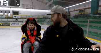 Alberta child rides Zamboni, a wish come true 
