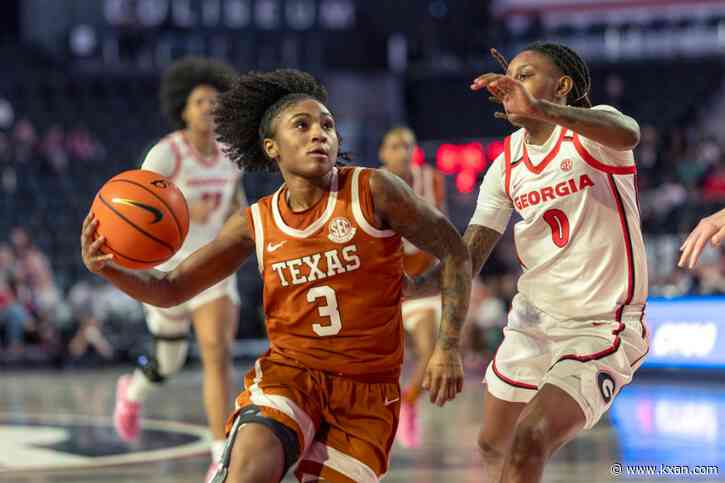 Newly No. 1 Texas overcomes sluggish start, rolls to 57-26 win over Georgia