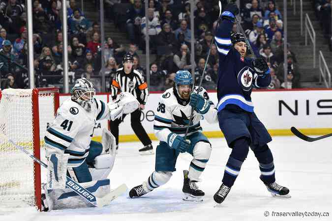 Jets rally to beat Sharks 2-1 in OT, extend win streak to 10 straight