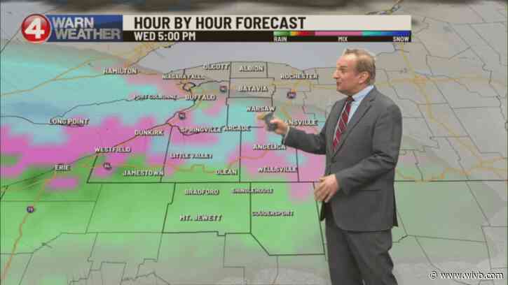 Tuesday showers taper to afternoon drizzle, mild