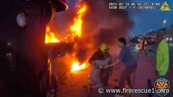 Video: Off-duty Ariz. FF/paramedic works with cop to rescue woman from burning truck