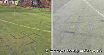 Swastika carved into Esher golf course in 'mindless act of vandalism'