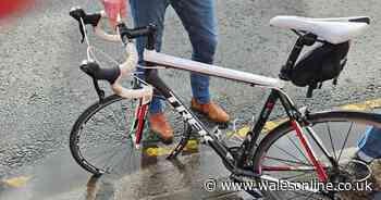 Cyclist flung over handlebars after hitting hidden pothole on main city road