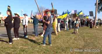 Over 100 people protest Elon Musk, DOGE outside Raleigh Tesla dealership