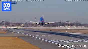 Commercial plane aborts landing to avoid collision with private jet in US