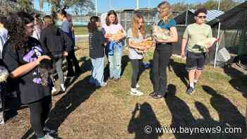 Randall Middle School students selling a dozen eggs for $4