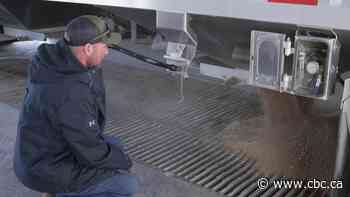 He sells all his grain in the U.S. Now, tariff threats have this Manitoba farmer 'racing against time'