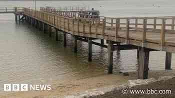 85-year-old wooden pier reopens after repairs
