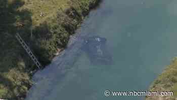 Person hospitalized after car crashes into canal off Turnpike in Miami-Dade