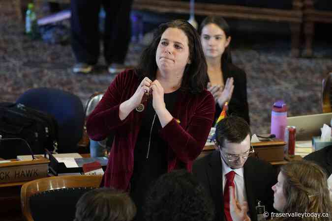 Iowa’s governor signs a bill removing gender identity protections from the state’s civil rights code