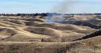 Grass fire breaks out as City of Lethbridge issues fire ban for Oldman River valley