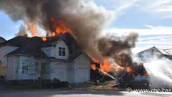 Explosion caused Langley, B.C., house fire that left 2 in critical condition, 1 unaccounted for: police