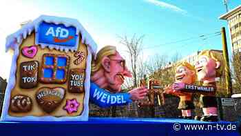 Spott für die Politik: Rosenmontagszüge zeigen Weidel als Hexe und Trump im Zirkus