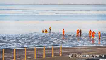 Brandweer redt vrouw die vastzit in slib