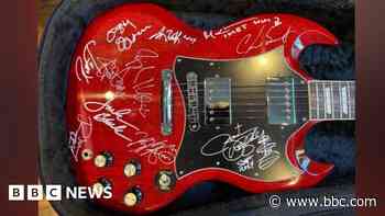 Signed Ozzy Osbourne guitar raises £15k for hospice