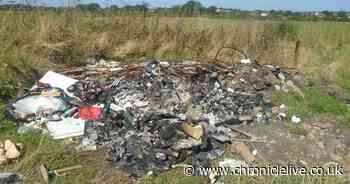 Washington man facing flytipping bill after huge pile of dumped waste set on fire in farmer's field