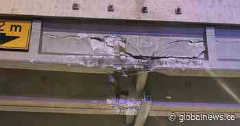 East Edmonton overpass damaged after being hit by semi-truck