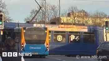 Bus and tram crash causes city rush hour delays