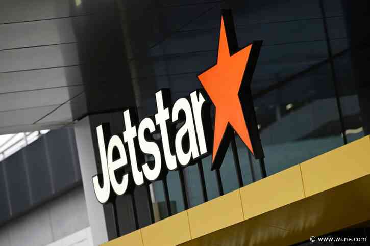 A boy with a loaded shotgun boarded a plane in Australia but was tackled by a former boxer