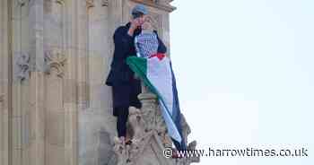 Barefoot man climbs Big Ben as emergency services work towards ‘safe conclusion’