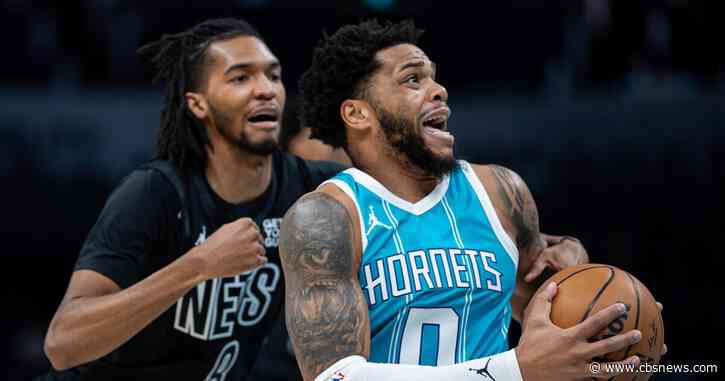 Hornets close with 12-0 run to beat Nets 105-102
