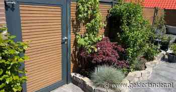 Mag je een schutting plaatsen zonder vergunning en hoe zit het met de erfgrens?