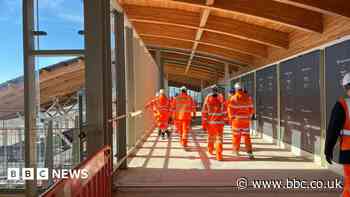 The new station with wildflowers and no car park