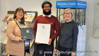 Plätzchenbäcker Pascal Aldoais wird mit der Silberdistel ausgezeichnet