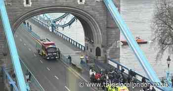 ‘AVOID area’ warning as Tower Bridge closed after man climbs onto railings