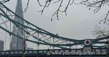 Man 'safely brought down' from Tower Bridge after climbing landmark