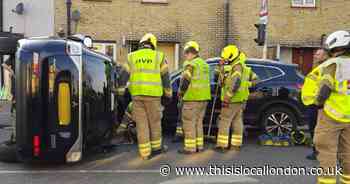 Man in hospital after crash in Dagenham leaves car on its side