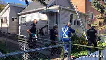 Woman arrested in connection with fatal Winnipeg house fire in 2021