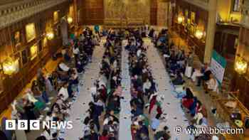 In pictures: People eat at free Iftar