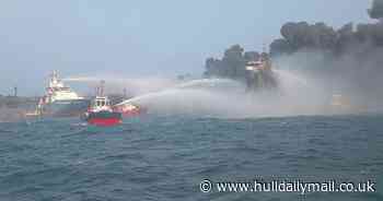 Vessels 'burn through the night' as one person remains missing after North Sea crash