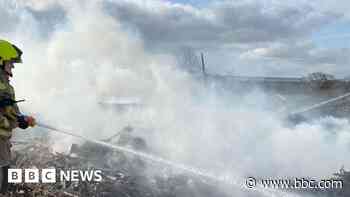 Three crews tackle household waste and tyres fire
