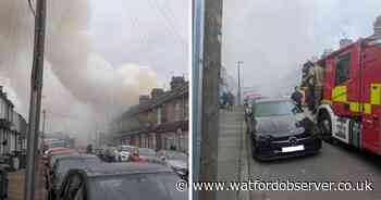 'No one injured' as six fire engines making progress battling  garage blaze