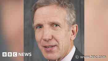 Stabbed plastic surgeon 'mistook intruder for son'