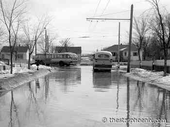 Child finds street-wide puddle in 1964 in Saskatoon
