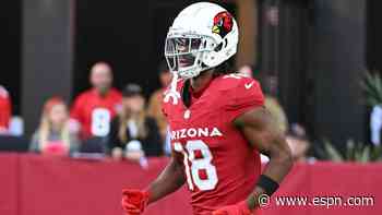 Cards' Harrison, Fanatic settle yearlong dispute