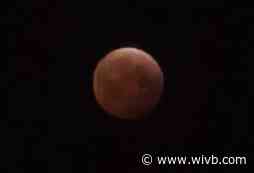 Photos: Overnight lunar eclipse makes sky a little bit darker