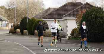 Father takes over running seven marathons challenge after son falls ill