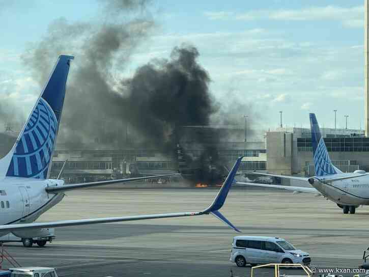 12 taken to hospital with minor injuries after plane catches fire at Denver airport