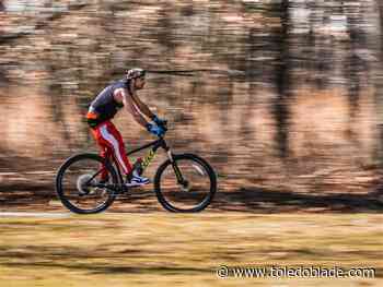 Friday warmth ties local record high