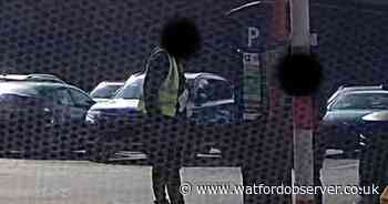 Warning after 'car park scammer in hi-vis drove off with woman's card'