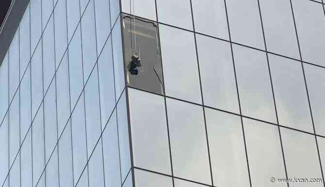 Glass panels falling downtown prompt street closure