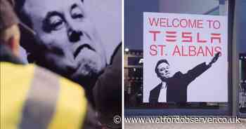 Anti Elon Musk 'swasticar' protest targets St Albans Tesla dealership