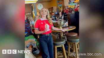 Katherine Jenkins sings national anthem in bar