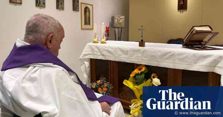 Pope seen praying at hospital chapel in photo released by Vatican